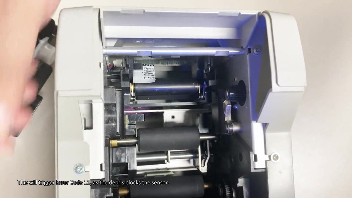 Inside an ID card printer during a repair